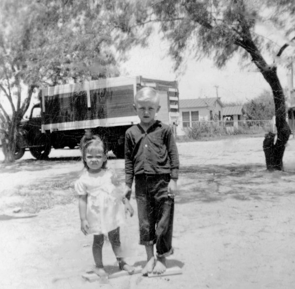 Little Girl and Little Boy on a Farm