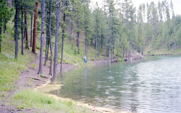 Fisherwoman on a Mountain Lake