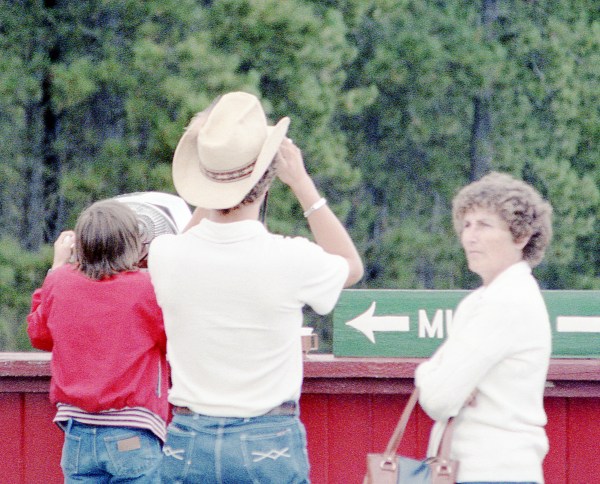 Tourists Examining a Monument